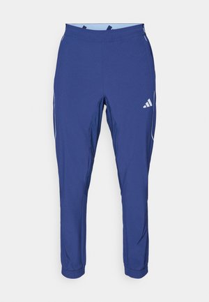 adidas Performance TECH APP - Pantalones deportivos - dark blue/glow blue