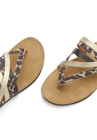 Brown suede flip-flops featuring crisscross straps in leopard print and metallic gold accents, with a flat, flexible sole.