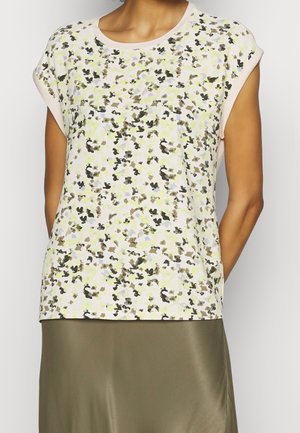 Top de manga corta con estampado floral en colores pasteles claros, con un cuello redondo y un corte holgado. Fabricado en un tejido suave y texturizado, con mangas enrolladas.