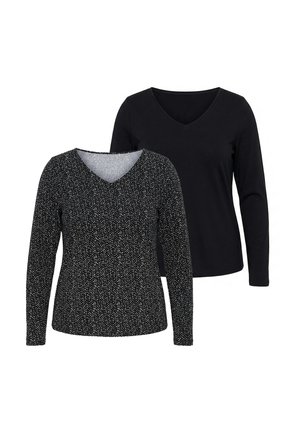 To dames tops med lange ærmer og V-udskæring, den ene ensfarvet sort og den anden sort med små hvide prikker, vist på hvid baggrund.