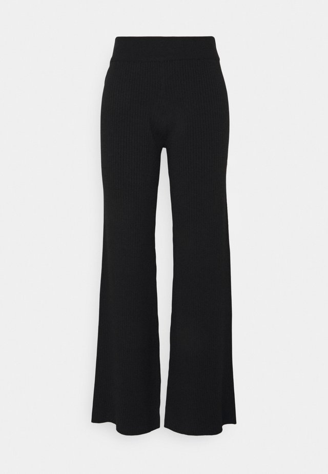 NA-KD X ZALANDO EXCLUSIVE RIBBED PANTS - Stoffhose - black
