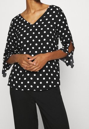 Blusa - black