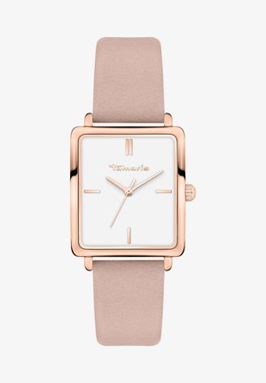 Montre carrée avec un cadran blanc et des accents en or rose, dotée d'un bracelet en cuir lisse rose pâle et de marqueurs d'heure minimalistes.
