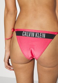 Calvin Klein Swimwear STRING SIDE TIE - Bas de bikini - pink flash