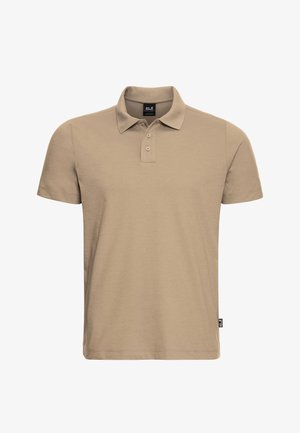 Beige short-sleeve polo shirt with a collar and two-button placket, featuring a small black Jack Wolfskin logo tag on the side seam.
