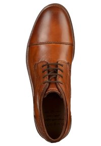 Bottine en cuir marron avec un bout arrondi, dotée de lacets marron, de coutures sur les côtés et d'une finition lisse et brillante. La semelle intérieure affiche le logo de la marque.