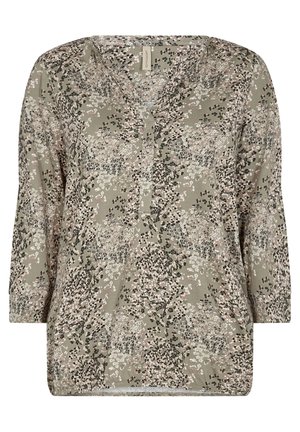 Chemisier à manches longues en olive avec un motif floral en rose, noir et blanc. Présente un col en V et une patte de boutonnage, tissu au toucher doux.