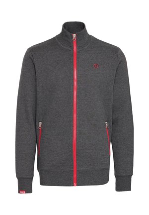 Grau melierter Kapuzenpullover mit hohem Kragen. Roter Reißverschluss und Akzente an den Taschen. Gerippte Bündchen und Saum, gefertigt aus weichem Stoff.