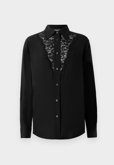 Black long-sleeve button-up shirt with lace panel detailing down the front and a pointed collar.