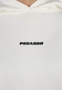 Pegador CLARITA - Felpa - washed warm white/black