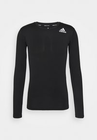 Schwarzes langärmliges Adidas Training-Shirt mit Rundhalsausschnitt und weißem Adidas-Logo auf der oberen rechten Brust.