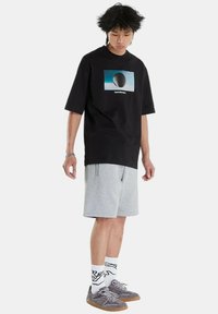 Calvin Klein Camiseta estampada - black
