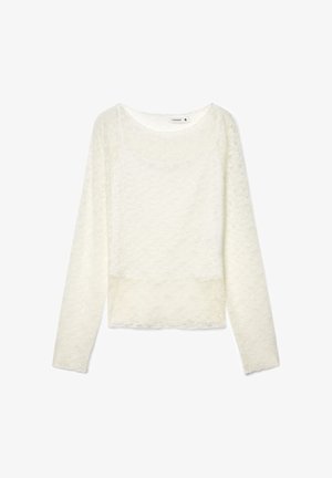 Top a maniche lunghe in pizzo color avorio, con scollo rotondo e motivo testurizzato su tutta la superficie, con un orlo leggermente corto.