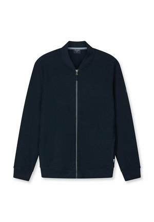 Navy blue zip-up jacket, featuring a textured fabric, ribbed collar, and cuffs, with a subtle brand tag on the side.