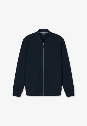 Navy blauw ritsjack, met een gestructureerde stof, ribbelkraag en -manchetten, met een subtiele merklabel aan de zijkant.