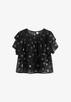 Schwarze durchsichtige Bluse mit geschichteten Rüschensäumen, die ein Sternenmuster in metallischem Silberton aufweist. Rundhalsausschnitt mit einer Rückenschließe.