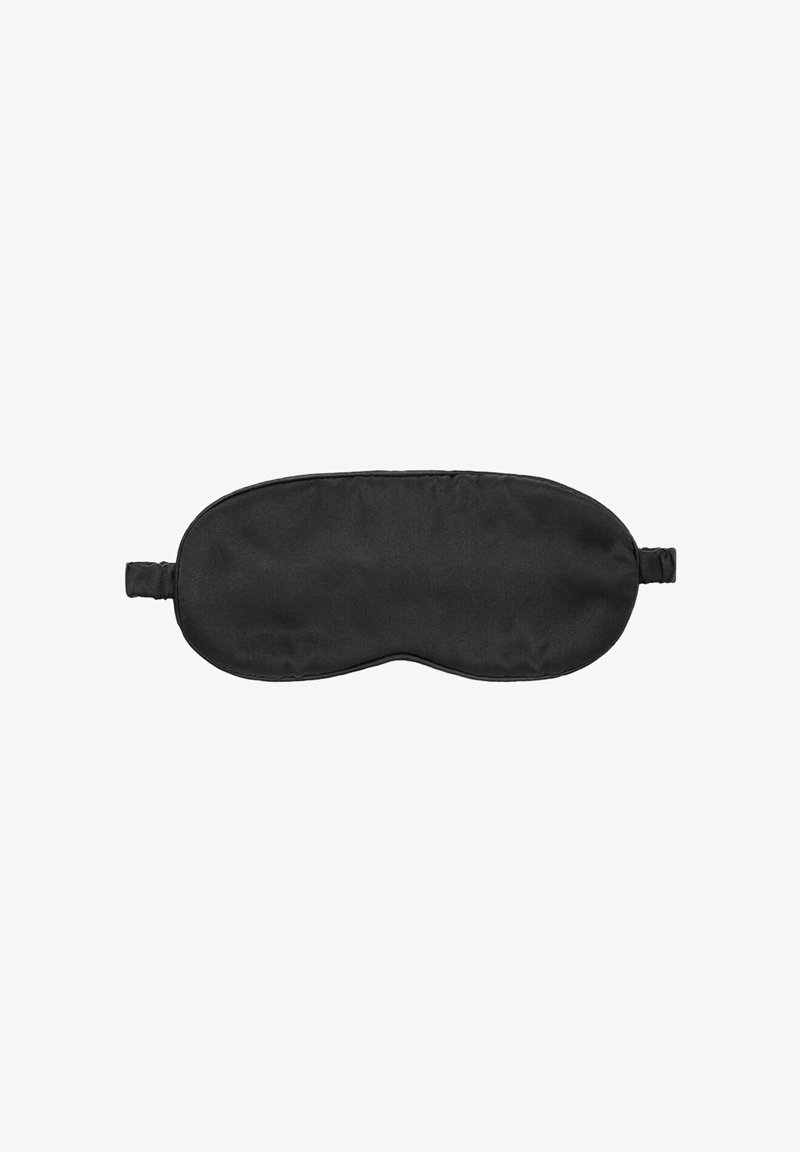 Masque de sommeil en tissu noir avec une sangle élastique conçu pour couvrir les yeux et bloquer la lumière pour dormir.