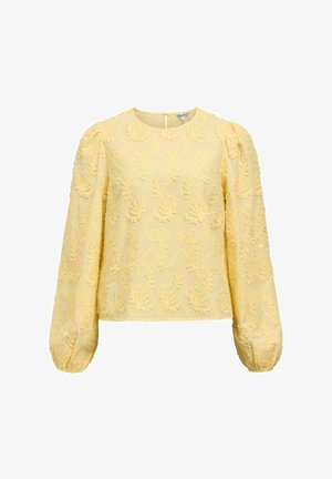 Geltona siuvinėta palaidinė su ilgomis pūstomis rankovėmis, puošta gėlių raštais ir apvaliomis kaklo iškirpte, pasiūta iš tekstūruotos medžiagos. Užsegama užpakalinėje dalyje su užtrauktuku.