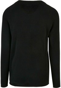 Svart långärmad stickad tröja med ett texturerat mönster, rundad halsringning och raglanärm. Slät tyg och rundad kantdetalj.