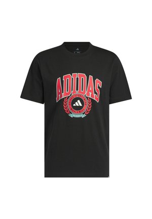 Crna pamučna majica s velikim crvenim logotipom "ADIDAS", okruženim zelenim lavrom, uz ime branda i tekst "WORLDWIDE".