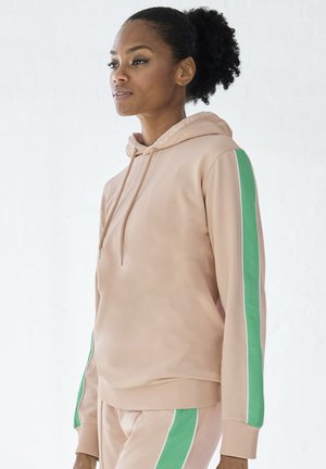 Kapuzensweatshirt aus weichem beigen Stoff mit grünen Seitenstreifen und gerippten Bündchen. Verfügt über einen Kordelzug und ein Logodetail an der Kapuze.