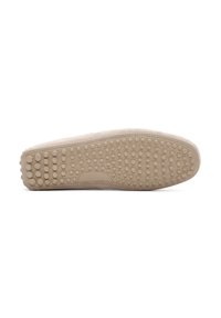 Beige Schuhsohle mit strukturierten Oberflächen und mehreren runden Erhebungen für besseren Halt. Der Rand ist leicht gewölbt und weist sichtbare Nähte auf.