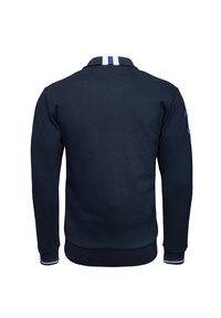 Navy blue sweatshirt with a classic collar, featuring white and blue stripes, ribbed cuffs, and textured fabric. Displayed from the back.