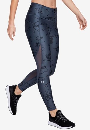 Leggings taille haute, gris foncé avec des motifs abstraits noirs, dotés de panneaux en maille sur les côtés et d'un tissu lisse et extensible.