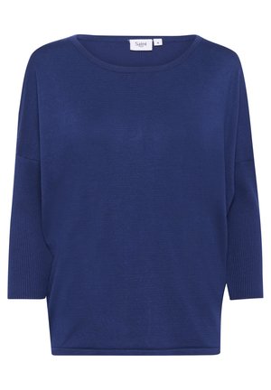 Mornarsko modra, ohlapna jopica z okroglim izrezom in rokavi do tri četrtine. Ima gladko teksturo in rebrast detajl ob straneh.