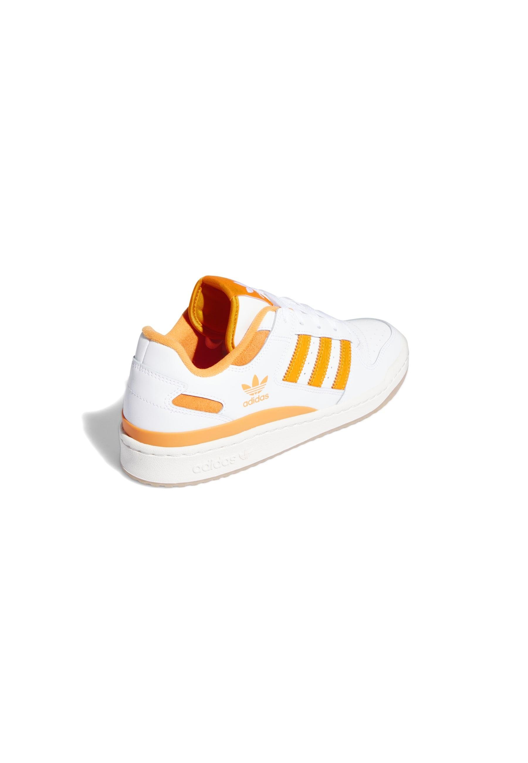 adidas originals forum 84 low trainers in white and orange