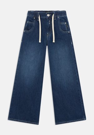 Pantalons en denim à jambes larges de couleur bleu foncé. Dotés d'une taille élastique avec cordons de serrage, de poches devant et derrière, et d'une texture lisse.