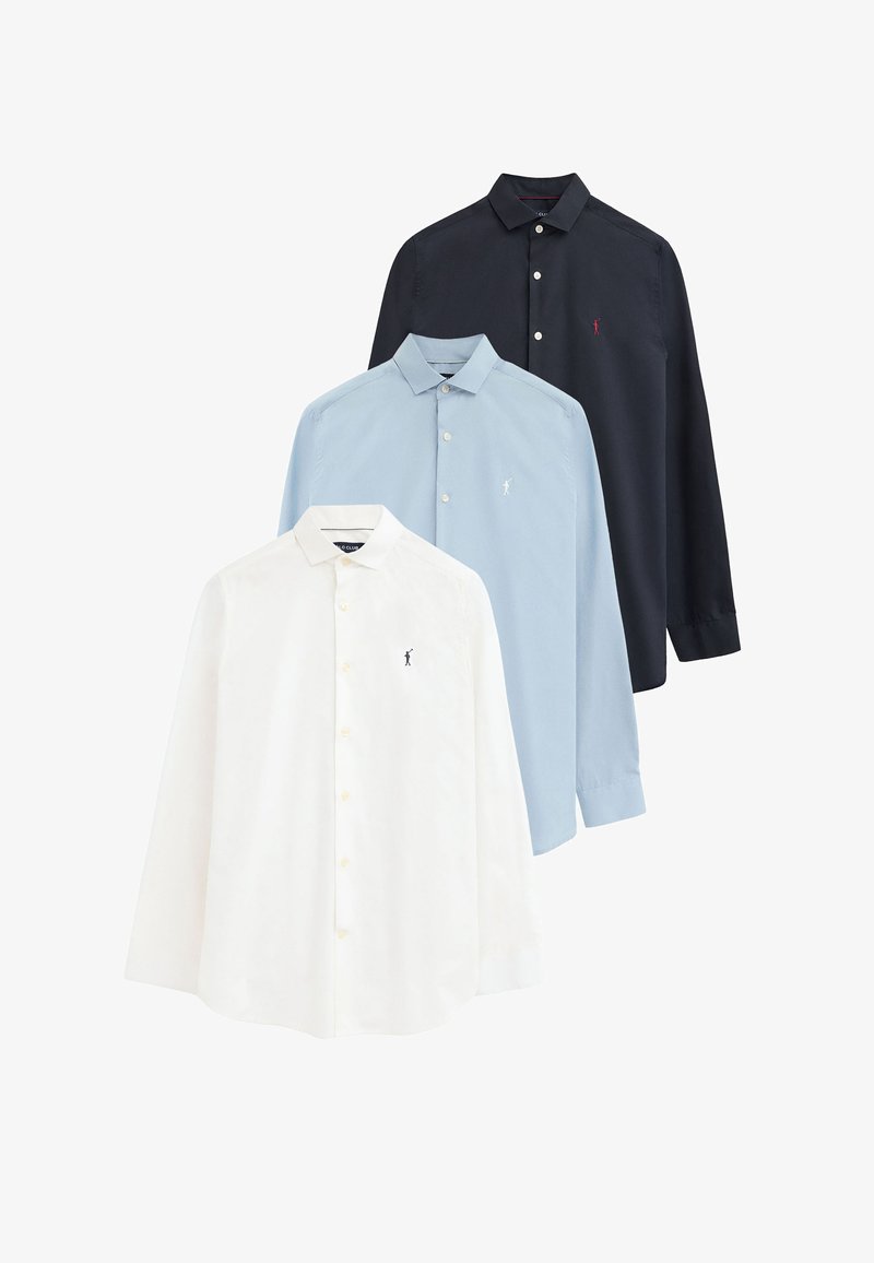 Three long-sleeve button-up shirts in white, light blue, and navy, each with a small embroidered logo on the left chest.