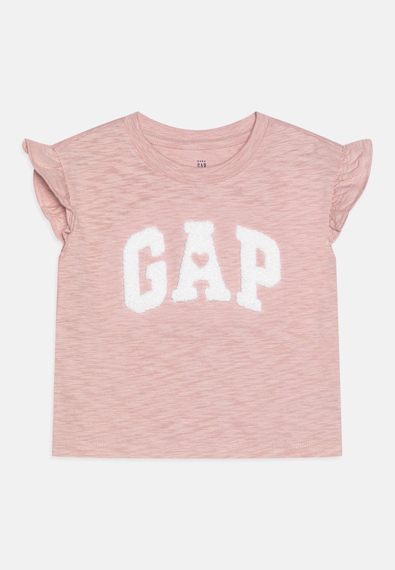Rozā īsām piedurknēm T-krekls ar puff piedurknēm un teksturētu baltu "GAP" logotipu ar sirdi. Mīksta auduma ar heathered apdari.