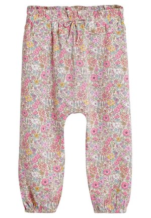 Pantalon pour enfants à taille élastique avec motifs floraux rose, jaune et blanc et poignets froncés.