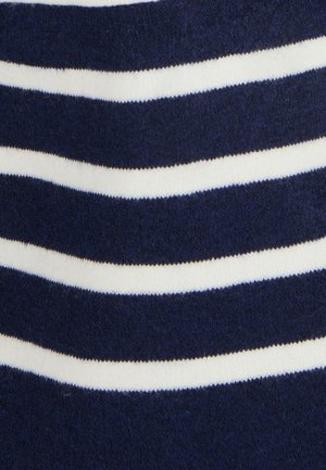 Marineblauwe stof met vier horizontale golvende witte strepen, de textuur lijkt zacht en pluizig.