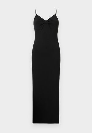Robe maxi noire sans manches avec fines bretelles spaghetti et détail froncé noué au niveau de la poitrine, présentée sur un fond blanc.