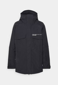 Schwarze Winterjacke mit Kapuze, Reißverschluss und Klappentaschen, verstellbaren Bündchen und "Burton"-Logo auf der Brusttasche.