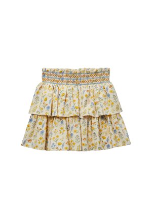 Jupe crème à volants avec imprimé floral jaune, bleu et orange et broderie smockée à la taille.