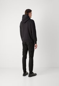 Calvin Klein BOX STRIPED LOGO HOODIE - Kapucni - black