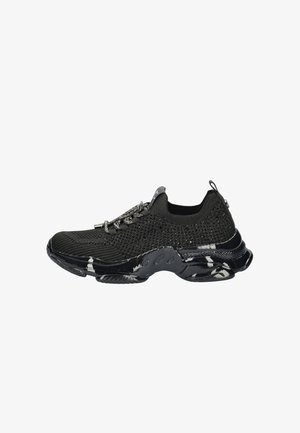 Black knit athletic shoe with textured mesh upper, rubber sole, and metallic lace accents. Features a streamlined design and pull tab.