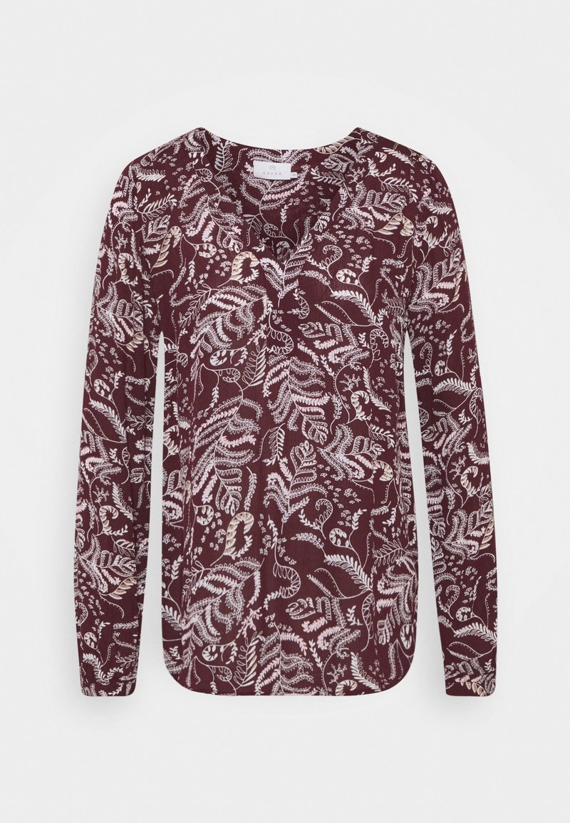 Blouse bordeaux à manches longues avec un motif floral blanc, décolleté en V et ourlet droit. Fabriquée en tissu léger et texturé.