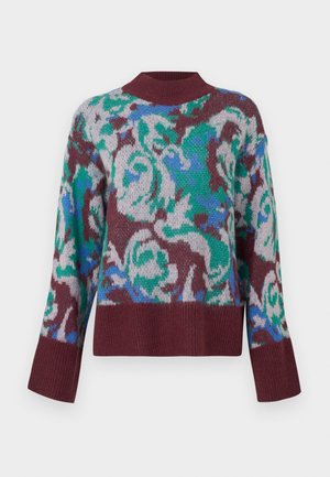 Der Strickpullover hat ein abstraktes Blumenmuster in Grün, Blau und Kastanienbraun, mit einem runden Halsausschnitt und breiten, leicht ausgestellten Ärmeln.