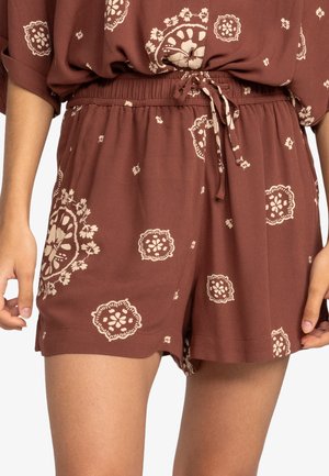 Shorts marroni con motivo floreale, dotati di una vita elastica e di un cordoncino. Realizzati in un tessuto leggero, con dettagli e accenti color crema.