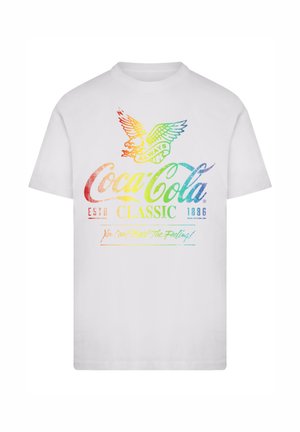 White T-shirt featuring a rainbow-colored Coca-Cola Classic logo with an eagle and the text "You Can't Beat The Feeling!"