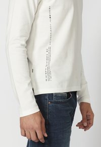 Koroshi Hosszú ujjú felső - crudo off white