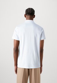KARL LAGERFELD POLO - Polo marškinėliai - white