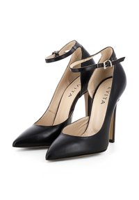 Décolleté neri in pelle con punta affusolata e cinturini alla caviglia. Presentano un design elegante, tacchi a stiletto e una finitura liscia.