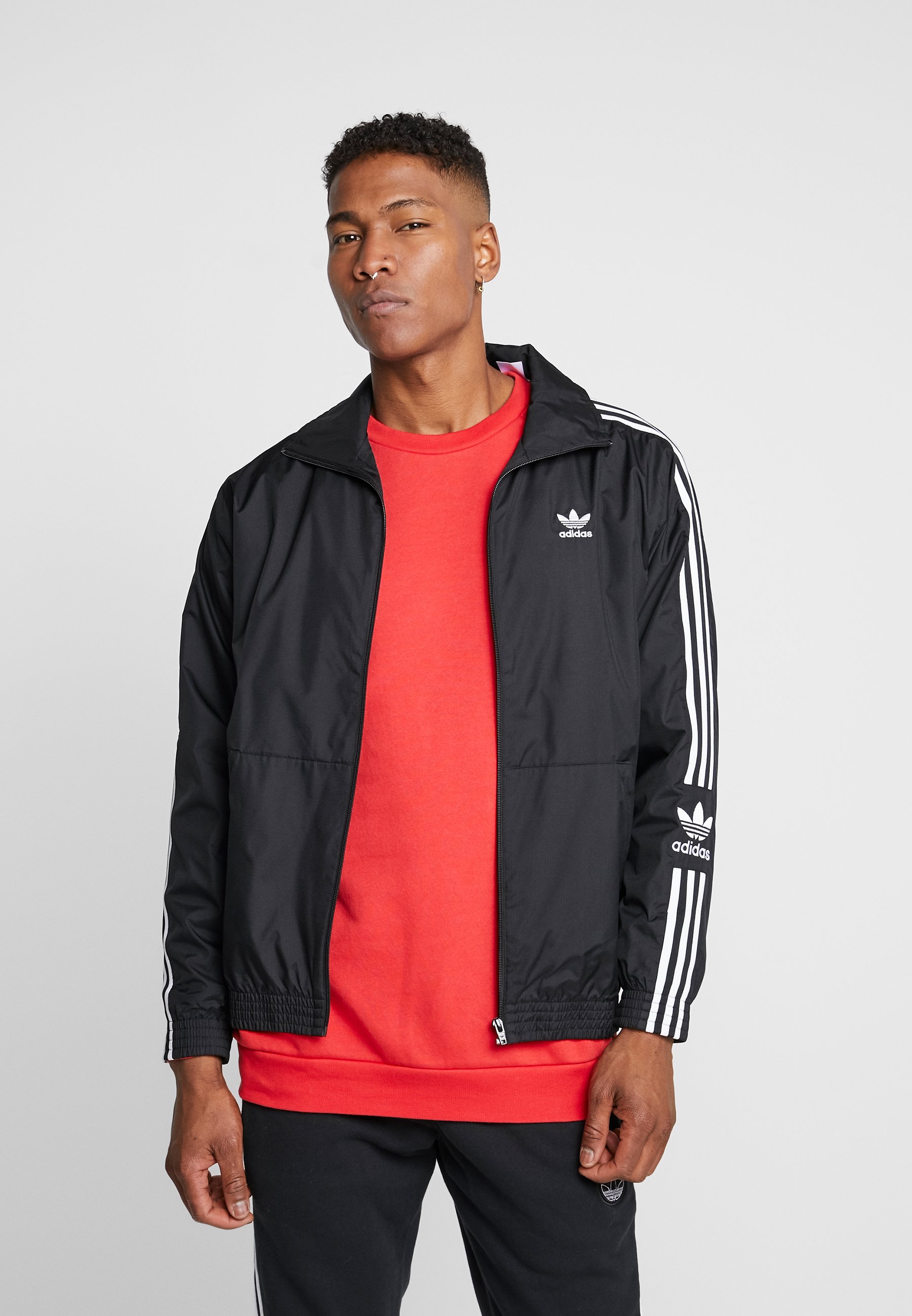 adidas originals lock up track top