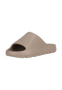 Beige slip-on sandal med en bred, öppen tådesign och texturerad sula, gjord av ett slätt gummi-liknande material. Har en konturerad form.