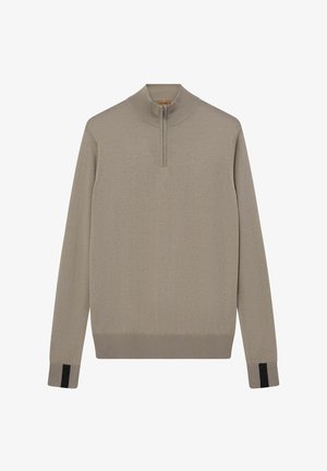 Maglione beige con colletto alto e chiusura a mezzzip. Presenta polsini a coste con accenti neri e un motivo di tricot strutturato.